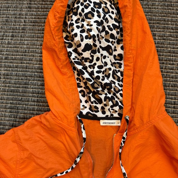 Vibrant Orange Windbreaker with Cheetah Accents - Picture 2 of 3